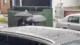 Ardahan'da Etkili Olan Dolu Yağışı Şehri Beyaza Büründürdü