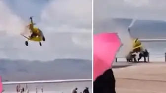Çin'de Hafif Hava Aracı Sahildeki İnsanların Üzerine Düştü